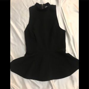 Black peplum top with sheer black